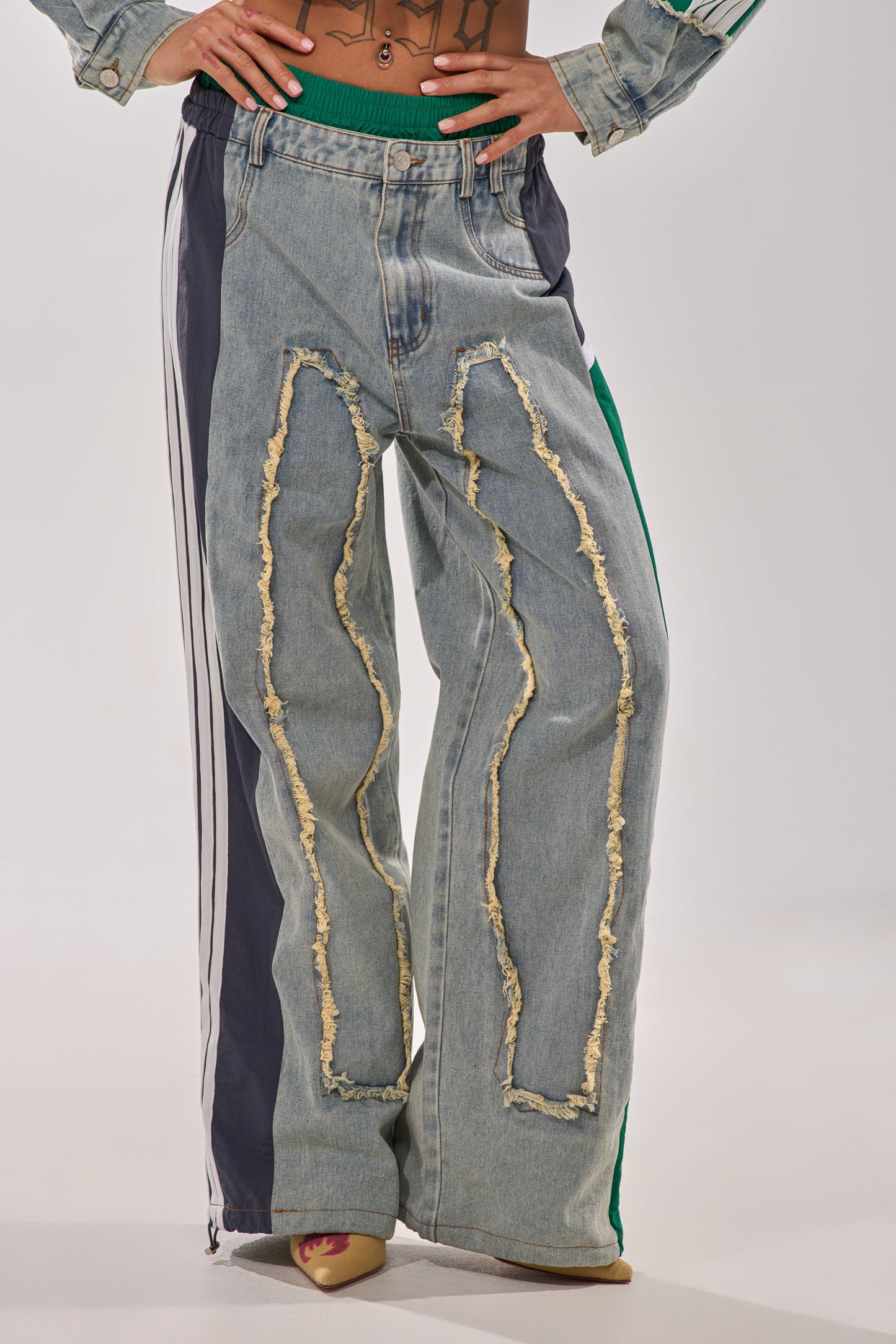 ALL AROUND THE WORLD PATCHWORK DENIM JOGGER PANT IN GREEN MULTI