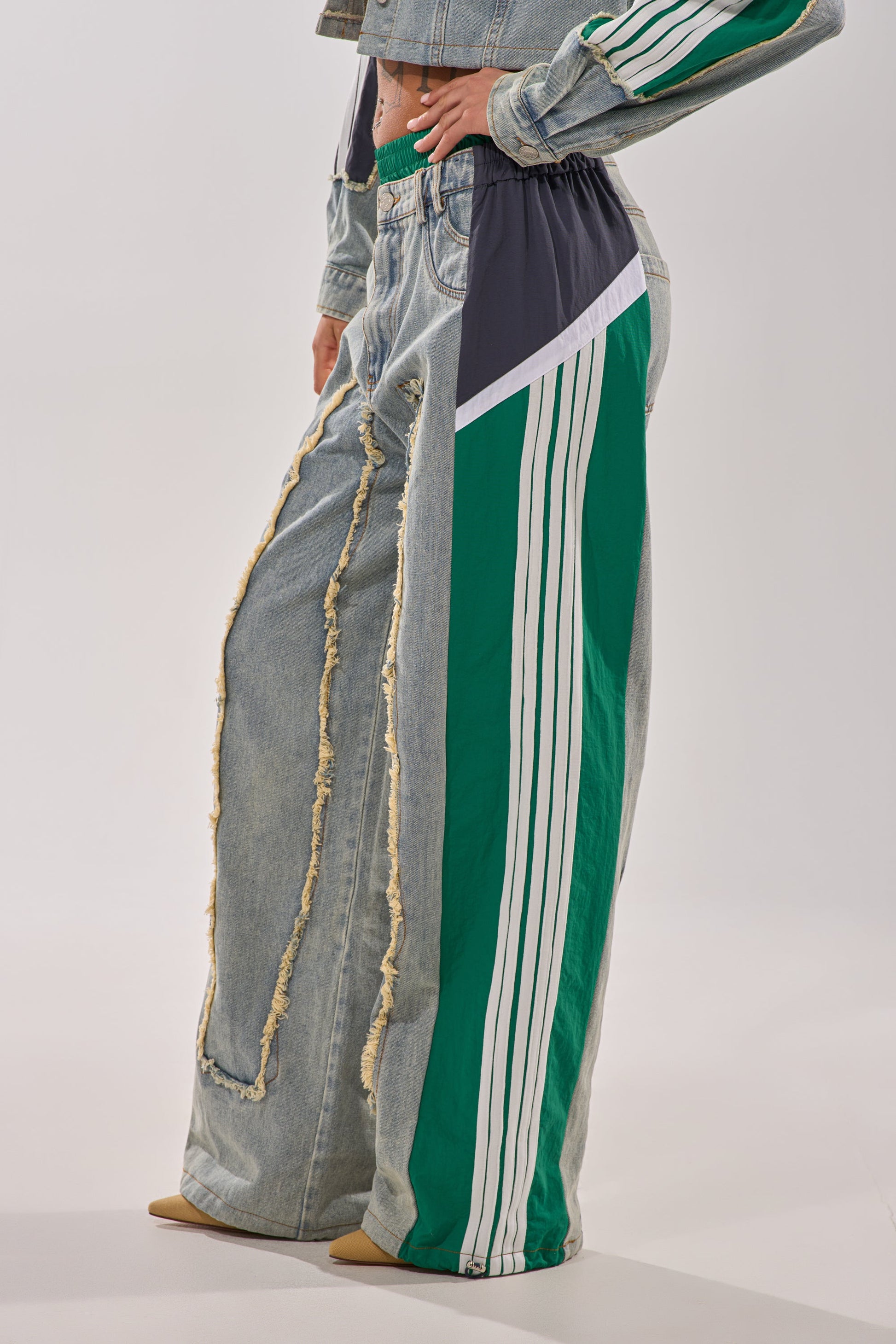 ALL AROUND THE WORLD PATCHWORK DENIM JOGGER PANT IN GREEN MULTI