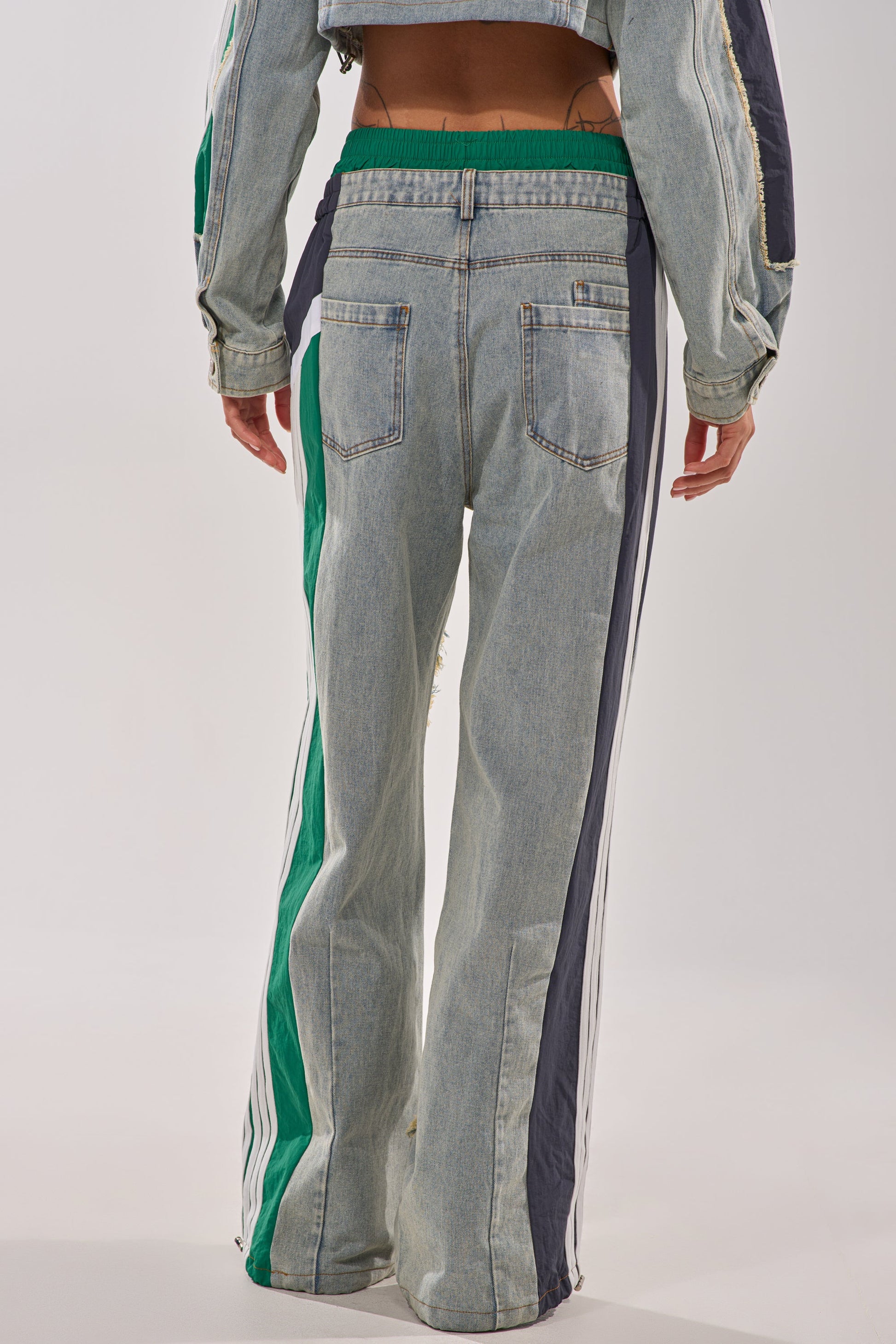 ALL AROUND THE WORLD PATCHWORK DENIM JOGGER PANT IN GREEN MULTI