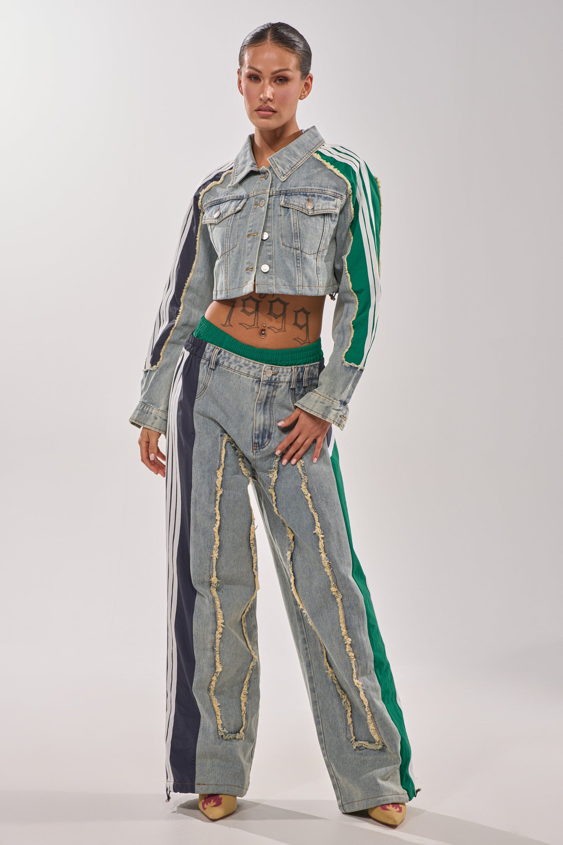 ALL AROUND THE WORLD PATCHWORK DENIM JOGGER PANT IN GREEN MULTI