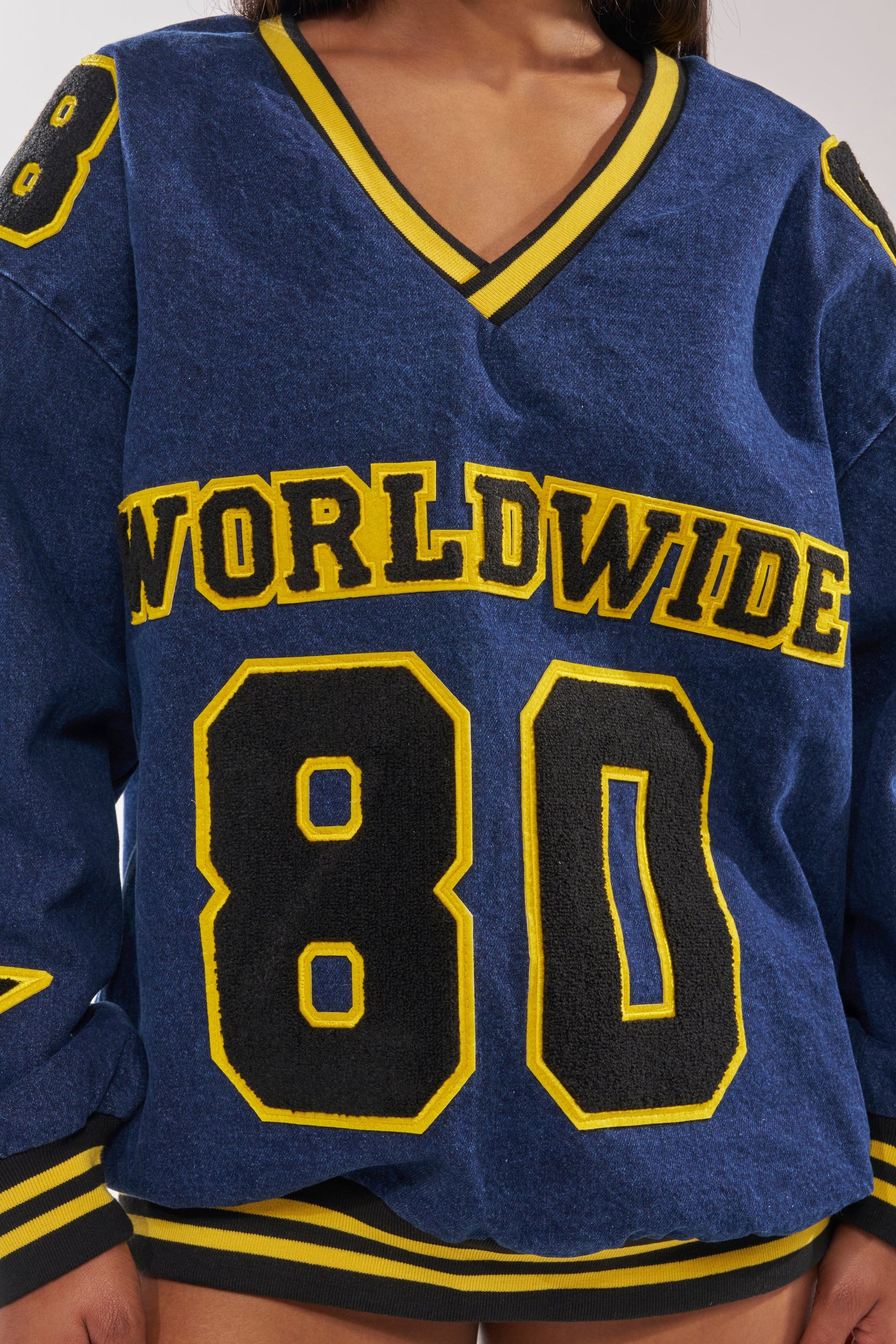 ALL AROUND THE WORLD DENIM SWEATSHIRT IN DARK BLUE